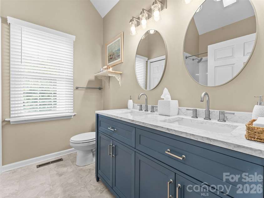 66 Hyde Avenue, Tryon, NC 28782.  MLS# CAR4403009, YatesRealty ID 41303. Primary BR ensuite bath