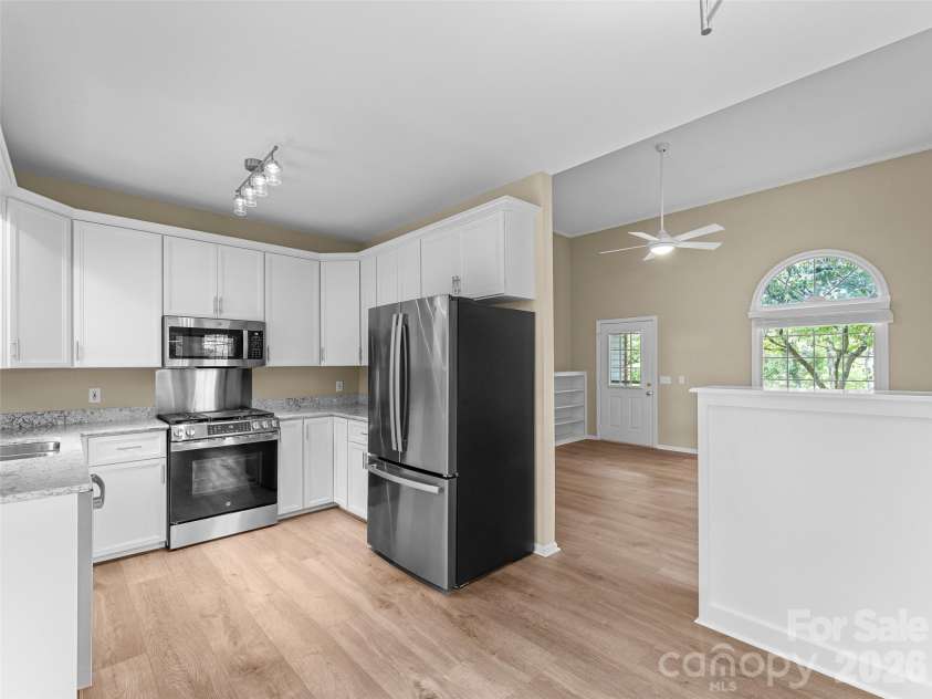 66 Hyde Avenue, Tryon, NC 28782.  MLS# CAR4403009, YatesRealty ID 41303. Updated kitchen with New SS appliances & granite countertops
