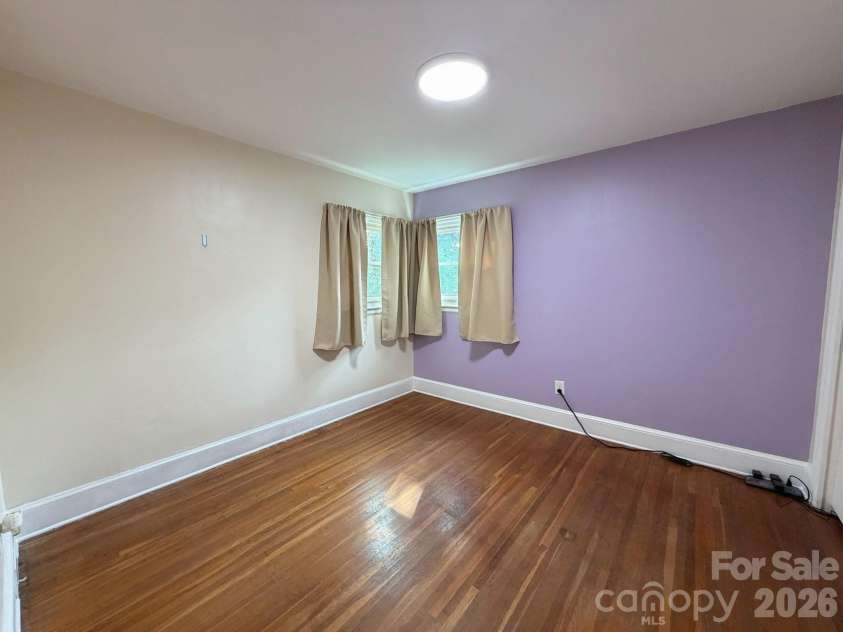 1327 Dresden Drive, Charlotte, NC 28205.  MLS# CAR4408814, YatesRealty ID 41312. Front Corner Bedroom