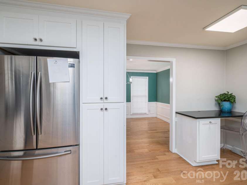 1308 Dumbarton Road, Gastonia, NC 28054.  MLS# CAR4396457, YatesRealty ID 41313. Kitchen showing desk area off to one corner