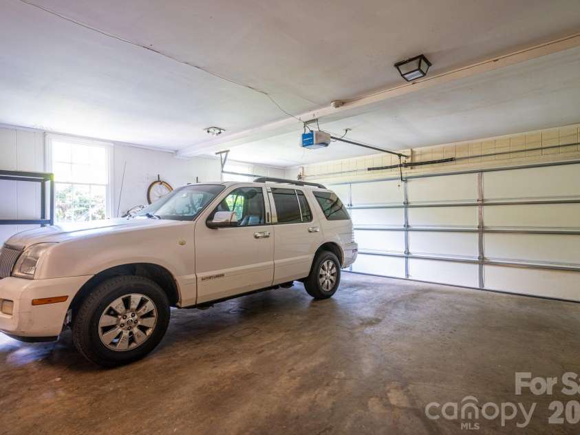 1308 Dumbarton Road, Gastonia, NC 28054.  MLS# CAR4396457, YatesRealty ID 41313. Two car Garage with storage