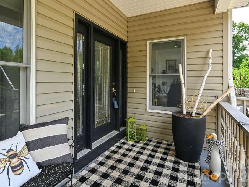 77 Carriage West Drive, Hendersonville, NC 28791.  MLS# CAR4403806, YatesRealty ID 41315. Front Deck