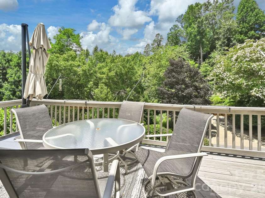77 Carriage West Drive, Hendersonville, NC 28791.  MLS# CAR4403806, YatesRealty ID 41315. Front Deck