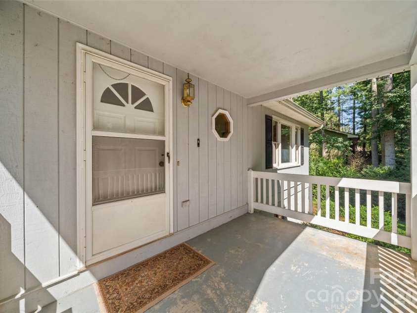 33 Baker Drive, Asheville, NC 28806.  MLS# CAR4406156, YatesRealty ID 41316. Front porch