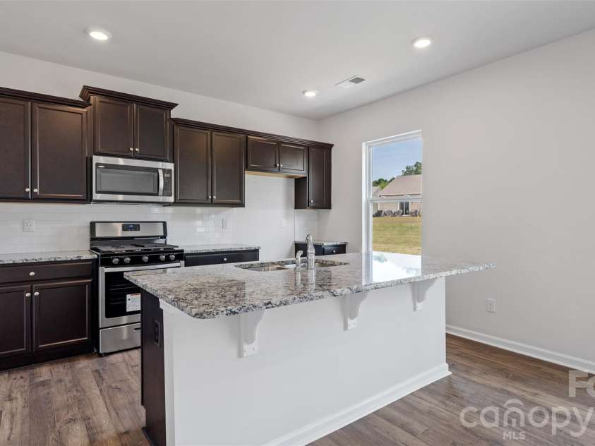 166 Bovine Branch Road, Fletcher, NC 28732.  MLS# CAR4354035, YatesRealty ID 4132. Photos are representative