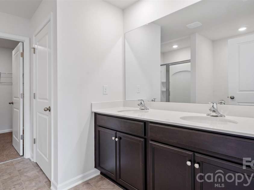 166 Bovine Branch Road, Fletcher, NC 28732.  MLS# CAR4354035, YatesRealty ID 4132. Photos are representative
