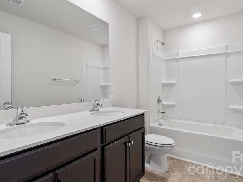 166 Bovine Branch Road, Fletcher, NC 28732.  MLS# CAR4354035, YatesRealty ID 4132. Photos are representative