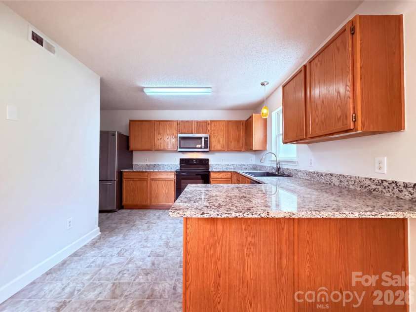 2916 Rosemeade Drive, Monroe, NC 28110.  MLS# CAR4410628, YatesRealty ID 41325. 