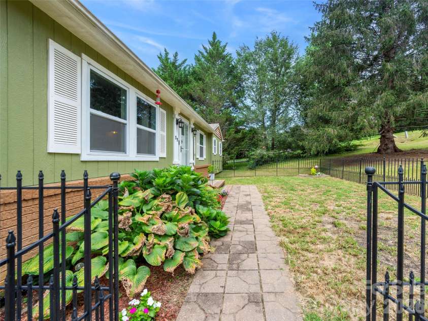 32 Reeves Road, Leicester, NC 28748.  MLS# CAR4407288, YatesRealty ID 41329. 