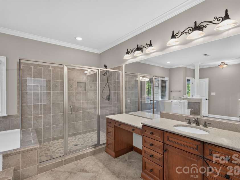 3003 Ocaso Court, Matthews, NC 28104.  MLS# CAR4401210, YatesRealty ID 41331. Primary Bath