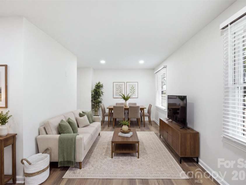 1403 Georgia Avenue, Monroe, NC 28112.  MLS# CAR4410762, YatesRealty ID 41332. Living Room AI Staged