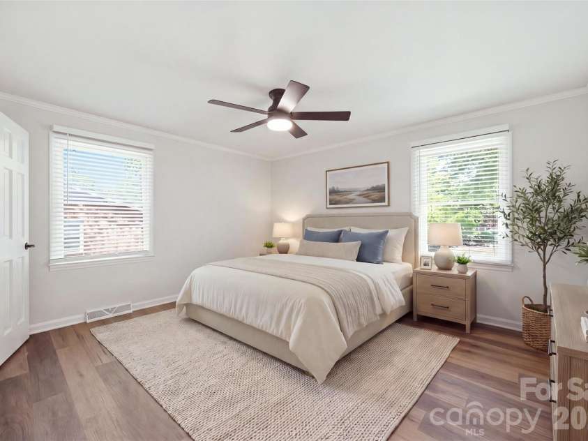 1403 Georgia Avenue, Monroe, NC 28112.  MLS# CAR4410762, YatesRealty ID 41332. Primary Bedroom AI Staged