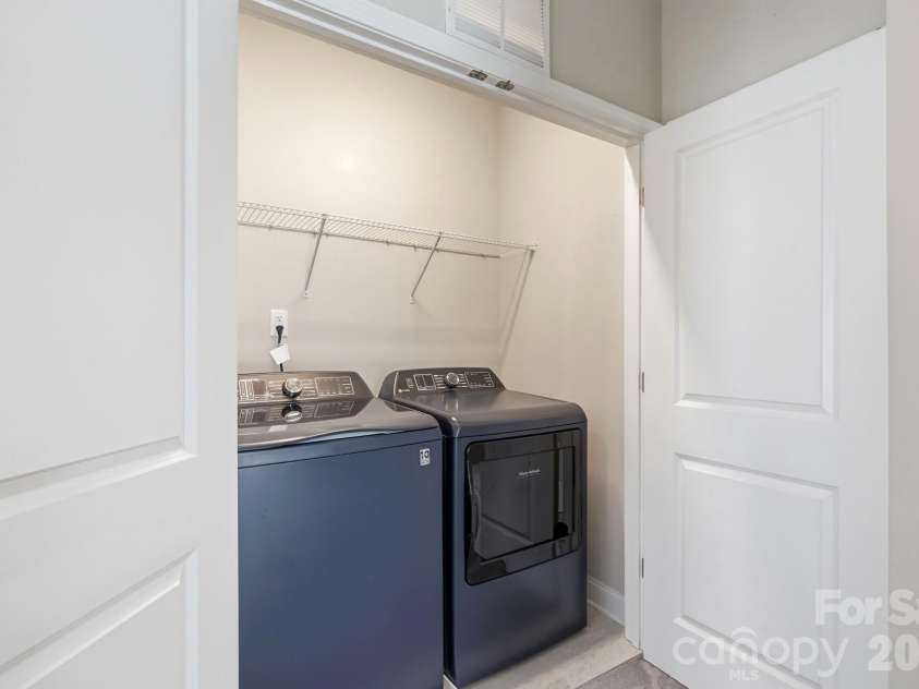 9406 Kings Parade Boulevard, Charlotte, NC 28273.  MLS# CAR4410774, YatesRealty ID 41349. Laundry on the upper level keeps chores simple and efficient.