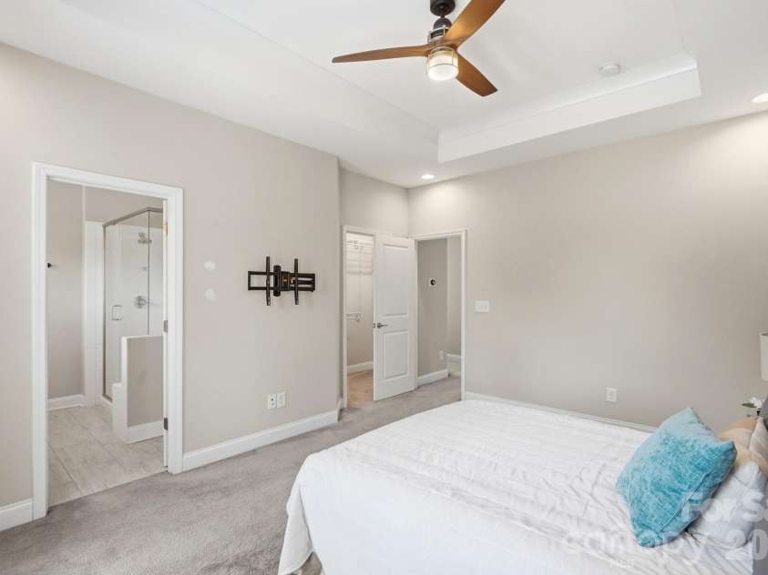 9406 Kings Parade Boulevard, Charlotte, NC 28273.  MLS# CAR4410774, YatesRealty ID 41349. Spacious primary suite offering comfort, privacy, and versatility.