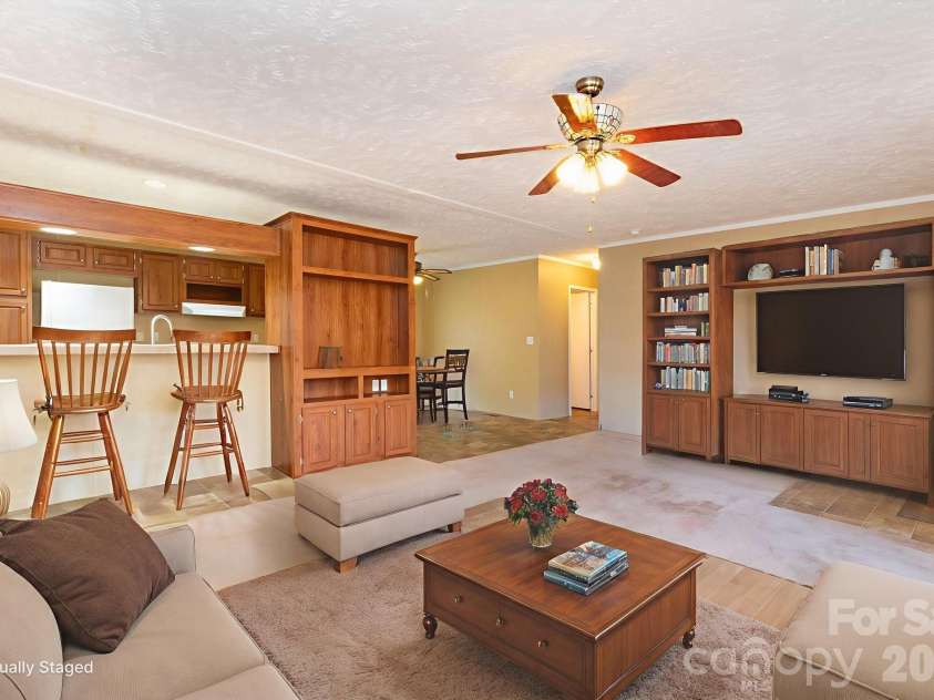 87 Hickory Nut Trace, Old Fort, NC 28762.  MLS# CAR4335774, YatesRealty ID 4135. Virtually Staged Living Room