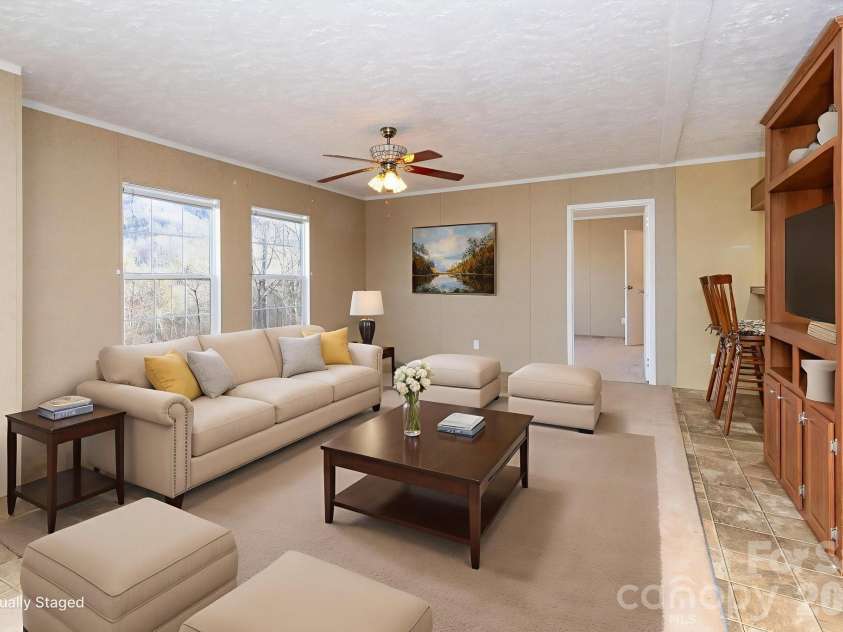 87 Hickory Nut Trace, Old Fort, NC 28762.  MLS# CAR4335774, YatesRealty ID 4135. Virtually Staged Living Room