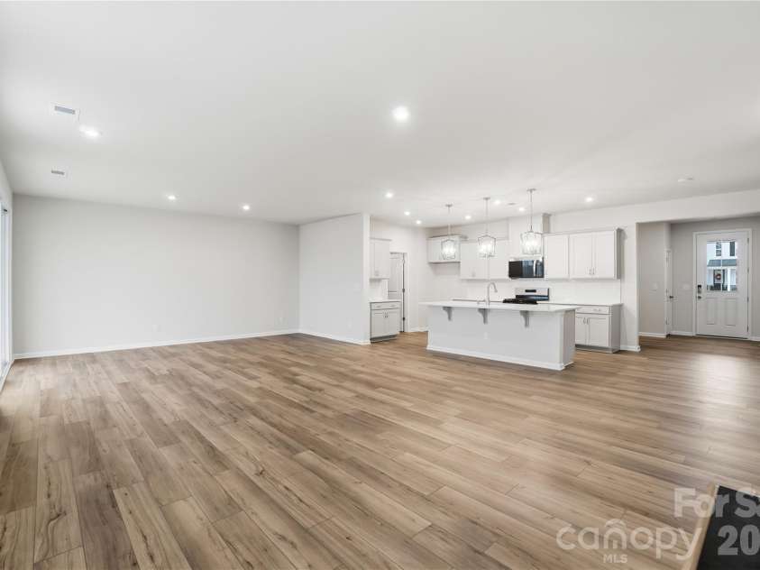 1460 Honey Trail, Monroe, NC 28110.  MLS# CAR4345051, YatesRealty ID 4136. Great room and kitchen