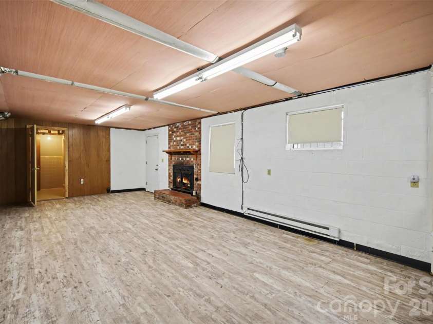 1300 Briarcliff Road, Shelby, NC 28152.  MLS# CAR4375199, YatesRealty ID 41360. Basement living room