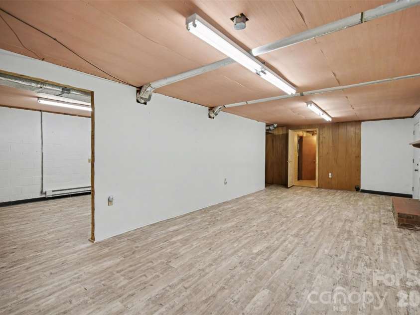 1300 Briarcliff Road, Shelby, NC 28152.  MLS# CAR4375199, YatesRealty ID 41360. Basement living room