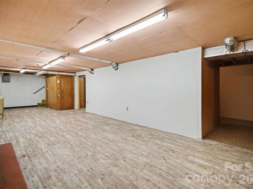 1300 Briarcliff Road, Shelby, NC 28152.  MLS# CAR4375199, YatesRealty ID 41360. Basement living room