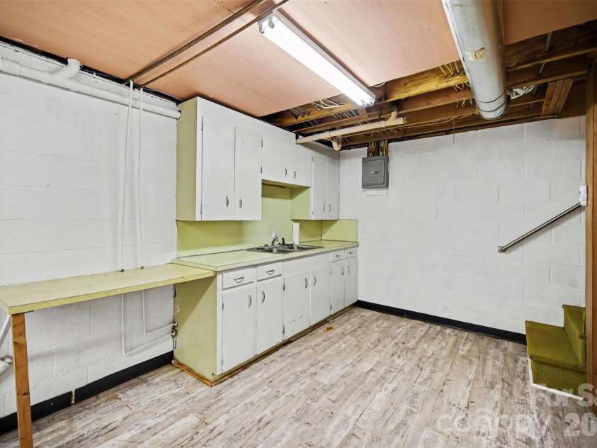 1300 Briarcliff Road, Shelby, NC 28152.  MLS# CAR4375199, YatesRealty ID 41360. Downstairs sink and cabinets