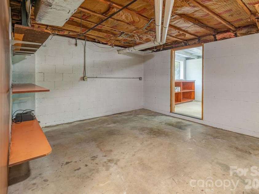47 Bell Road, Asheville, NC 28805.  MLS# CAR4402411, YatesRealty ID 41364. Basement utility room.
