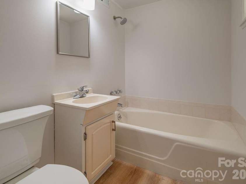 47 Bell Road, Asheville, NC 28805.  MLS# CAR4402411, YatesRealty ID 41364. Full bath on lower level.