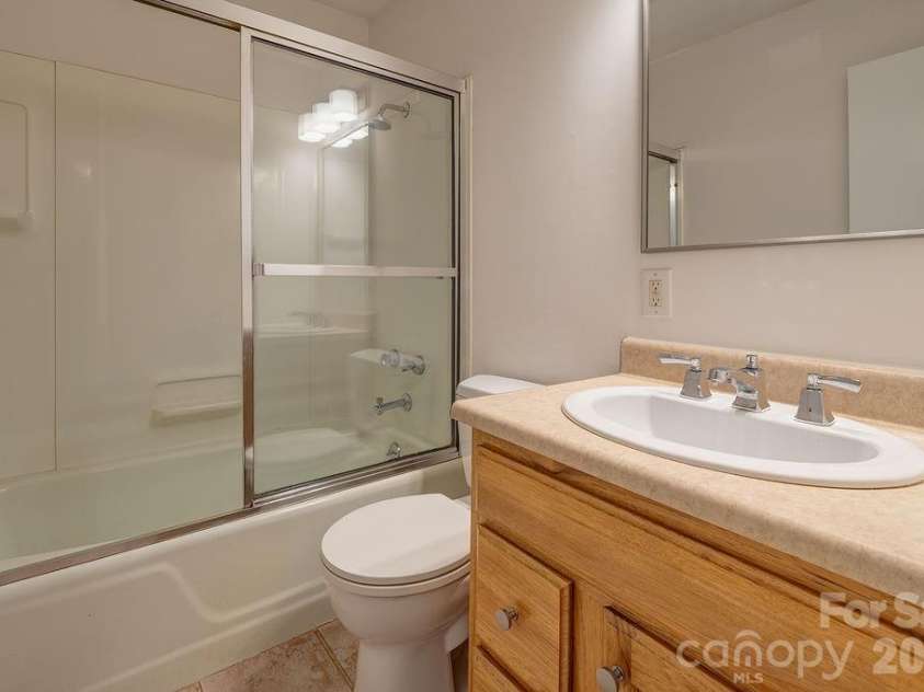 47 Bell Road, Asheville, NC 28805.  MLS# CAR4402411, YatesRealty ID 41364. Full bath on the main level.