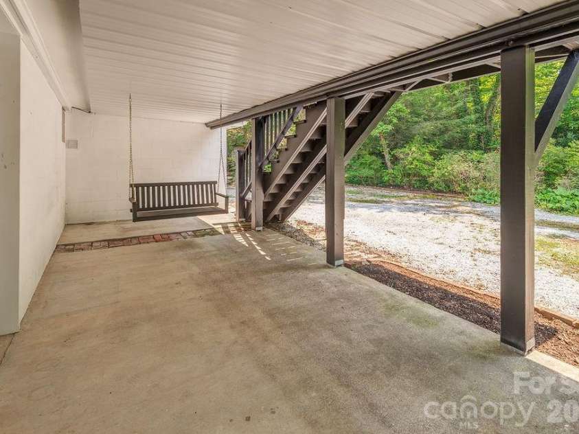 47 Bell Road, Asheville, NC 28805.  MLS# CAR4402411, YatesRealty ID 41364. Lower level patio makes the perfect swing spot!