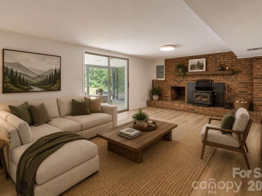 47 Bell Road, Asheville, NC 28805.  MLS# CAR4402411, YatesRealty ID 41364. Virtually staged den / family room.