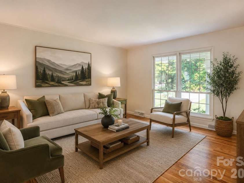 47 Bell Road, Asheville, NC 28805.  MLS# CAR4402411, YatesRealty ID 41364. Virtually staged living room.
