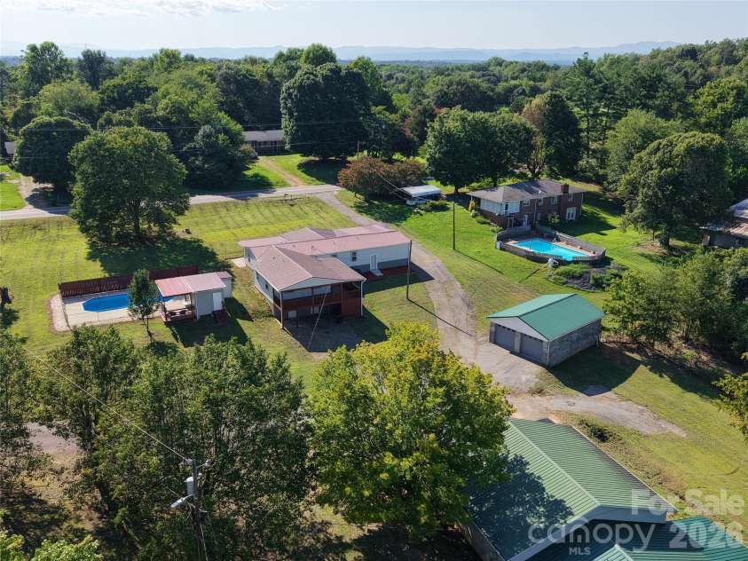 2295 Shady Grove Road, Connelly Springs, NC 28612.  MLS# CAR4408427, YatesRealty ID 41369. Main Home and Pool
