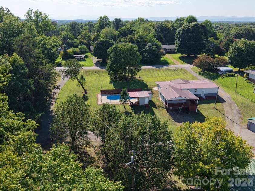 2295 Shady Grove Road, Connelly Springs, NC 28612.  MLS# CAR4408427, YatesRealty ID 41369. Main Home and Pool