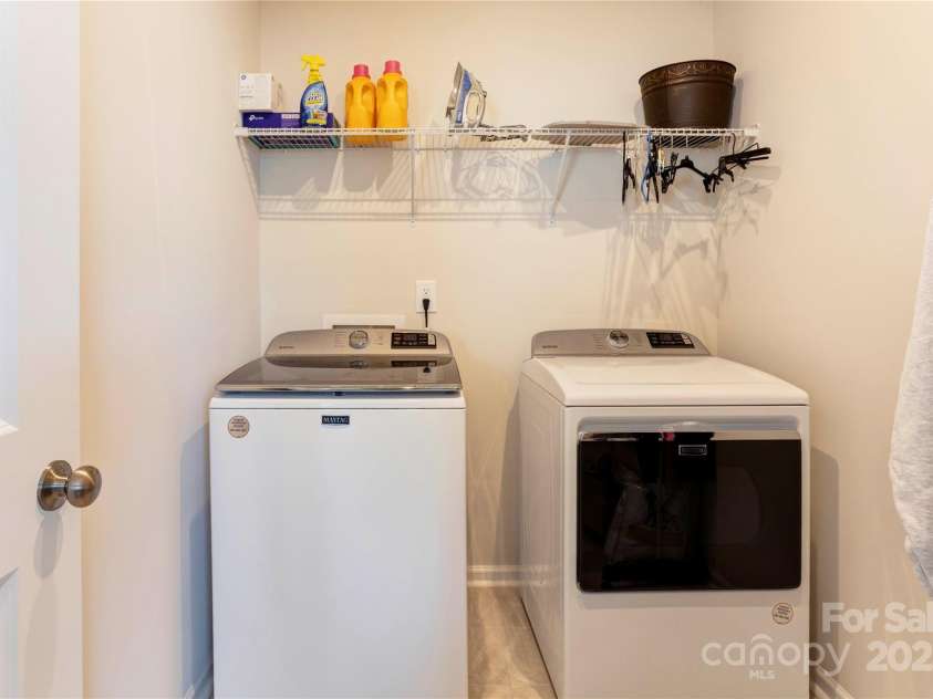 6391 Lopez Court, Kannapolis, NC 28081.  MLS# CAR4239053, YatesRealty ID 4137. Large laundry room on the upper level.
