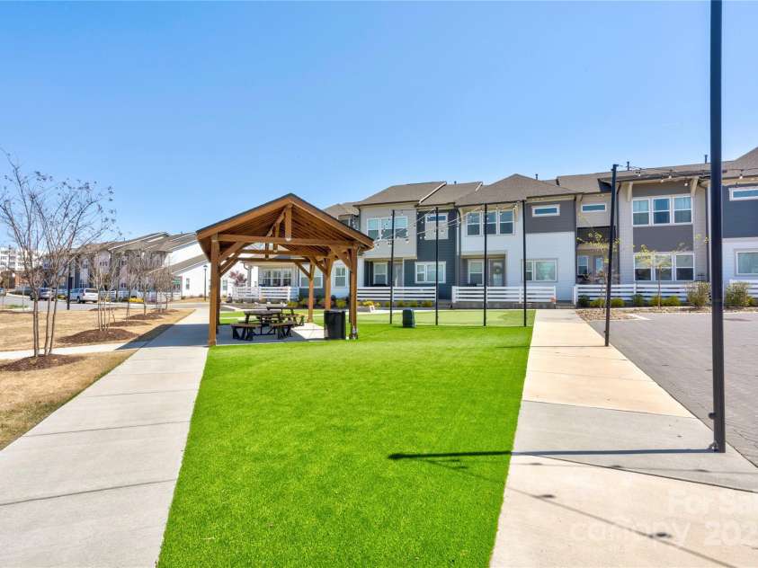 6391 Lopez Court, Kannapolis, NC 28081.  MLS# CAR4239053, YatesRealty ID 4137. Putting green & picnic area.