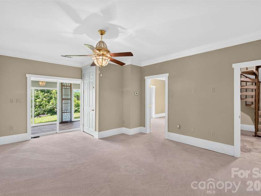 370 Mountain Side Drive, Columbus, NC 28722.  MLS# CAR4406974, YatesRealty ID 41377. Den/hangout area downstairs in basement