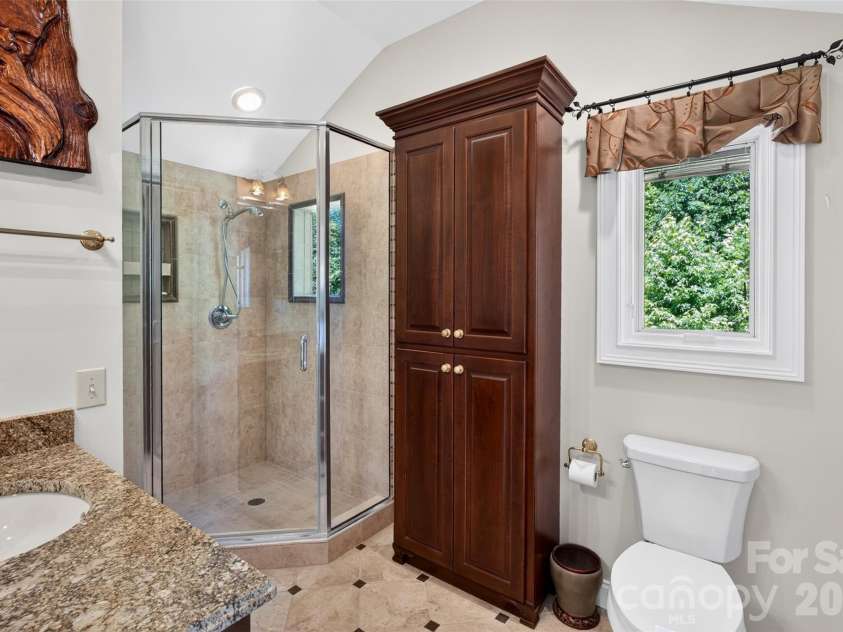 370 Mountain Side Drive, Columbus, NC 28722.  MLS# CAR4406974, YatesRealty ID 41377. The primary bathroom for the Loft bedroom