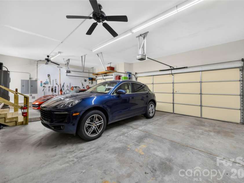 144 Quail Haven Drive, Troutman, NC 28166.  MLS# CAR4401635, YatesRealty ID 41381. 3 car garage has extra storage space