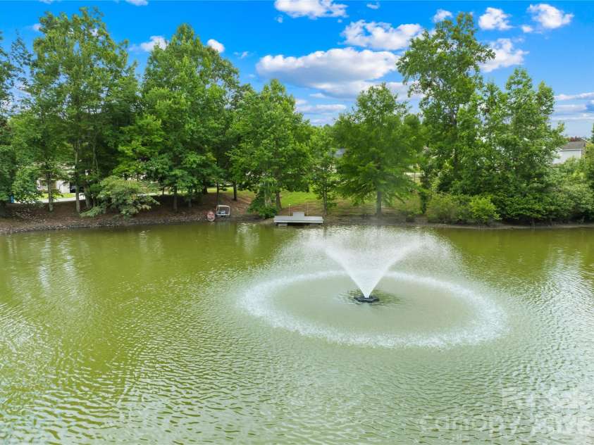 144 Quail Haven Drive, Troutman, NC 28166.  MLS# CAR4401635, YatesRealty ID 41381. Community pond is a few steps away
