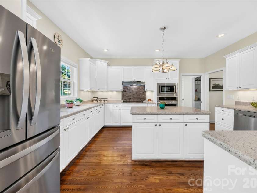 144 Quail Haven Drive, Troutman, NC 28166.  MLS# CAR4401635, YatesRealty ID 41381. Kitchen refrigerator conveys