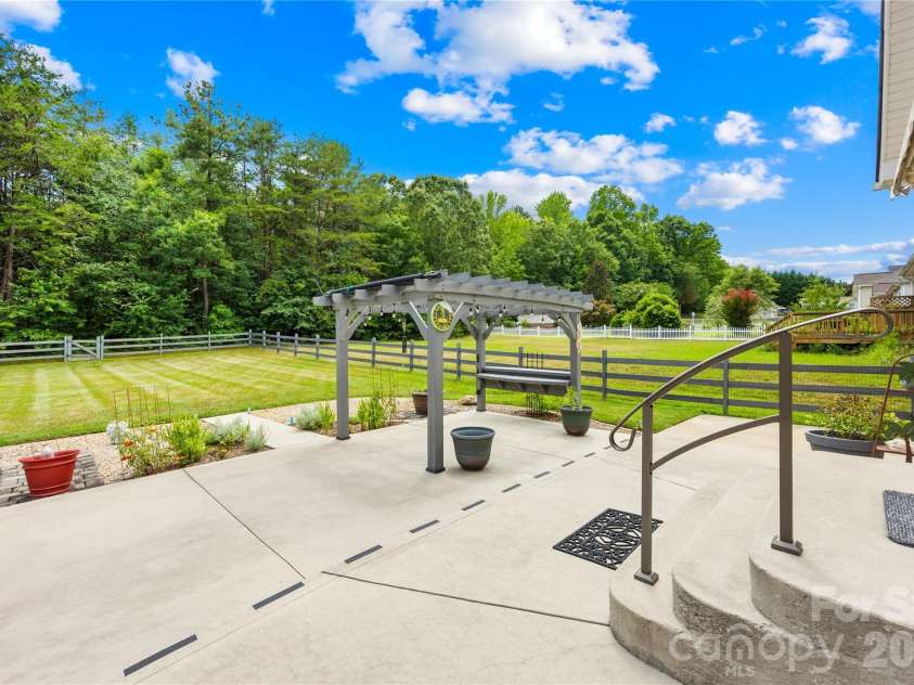 144 Quail Haven Drive, Troutman, NC 28166.  MLS# CAR4401635, YatesRealty ID 41381. Relax on the patio