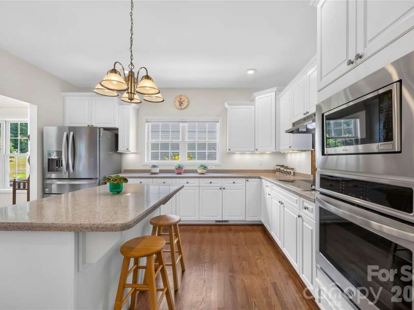144 Quail Haven Drive, Troutman, NC 28166.  MLS# CAR4401635, YatesRealty ID 41381. Stainless appliances and solid surface countertops