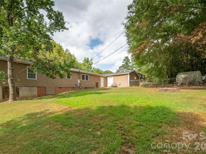 1124 Threatt Street, Lancaster, SC 29720.  MLS# CAR4407802, YatesRealty ID 41389. Fully fenced backyard