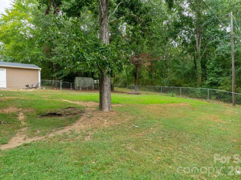1124 Threatt Street, Lancaster, SC 29720.  MLS# CAR4407802, YatesRealty ID 41389. Fully fenced backyard