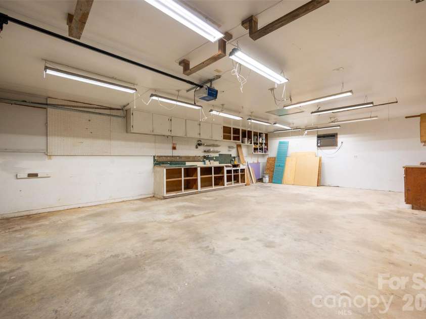 1124 Threatt Street, Lancaster, SC 29720.  MLS# CAR4407802, YatesRealty ID 41389. Garage w/workspace and AC unit