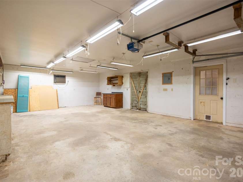 1124 Threatt Street, Lancaster, SC 29720.  MLS# CAR4407802, YatesRealty ID 41389. Garage w/workspace and AC unit