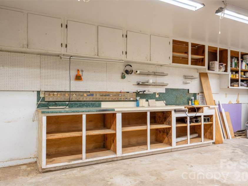 1124 Threatt Street, Lancaster, SC 29720.  MLS# CAR4407802, YatesRealty ID 41389. Garage w/workspace and AC unit