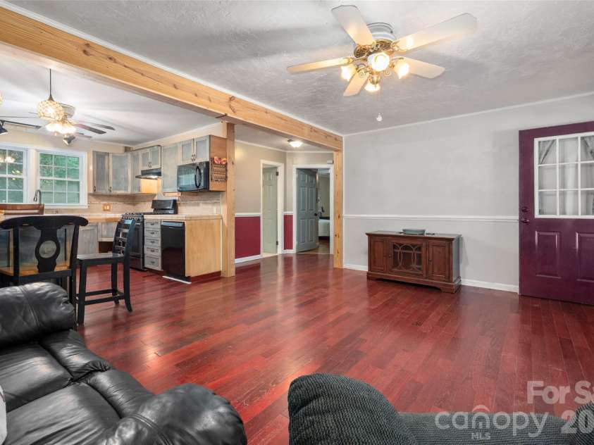 1124 Threatt Street, Lancaster, SC 29720.  MLS# CAR4407802, YatesRealty ID 41389. Living Room looking into the kitchen and down hallway