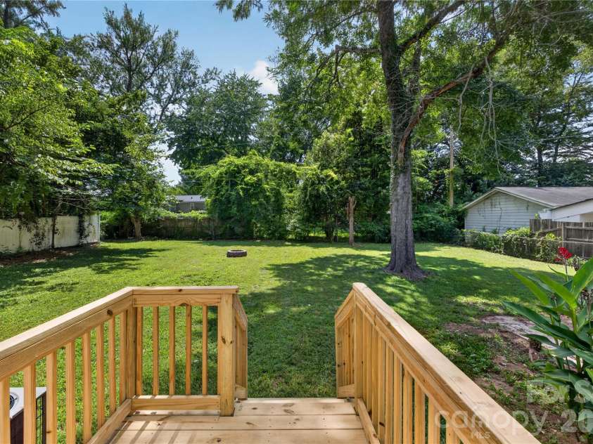 3826 Sudbury Road, Charlotte, NC 28205.  MLS# CAR4410266, YatesRealty ID 41393. Back deck overlooking the yard space