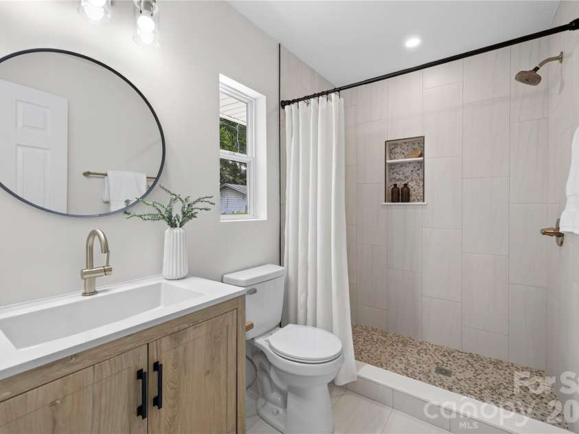 3826 Sudbury Road, Charlotte, NC 28205.  MLS# CAR4410266, YatesRealty ID 41393. Primary bathroom